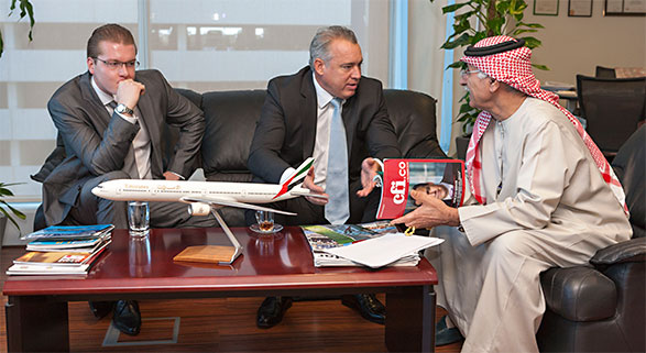 Mohammed A Al Khaja, Vice Chairman of The Emirates Airline Foundation receiving recognition from CFI.co (from left: Marten Mark and Tor Svensson)