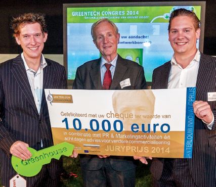 Floris Wolters (left) and his brother Roderick (right) of Solar Solutions Worldwide accept the Jan Terlouw Innovatieprijs (Innovation Award) 2014 from Mr Terlouw (centre), an acclaimed author, scientist, and former minister of economic affairs and member of parliament. The award is given out annually by the kiEMT Foundation of the Netherlands to the most innovative entrepreneur in the field of sustainable energy. Photo: John Voermans