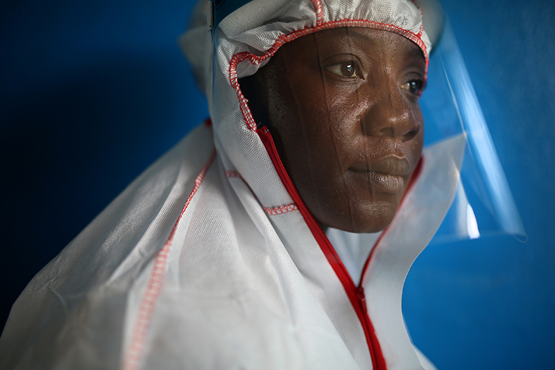 Nurse Helena D. Sayuoh wears protective gear while working at a hospital in Liberia in 2015.
